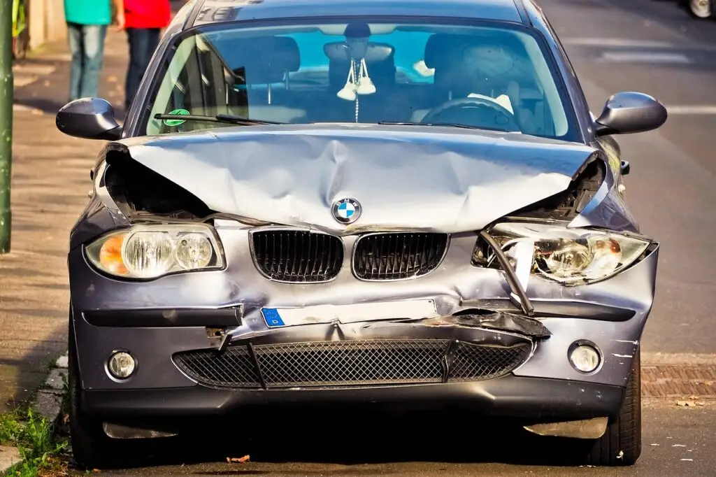 Auto Accident Damage — Mr. Crash Coach Front-end car damage after an accident — used by Mr. Crash Coach to illustrate real insurance claim scenarios.